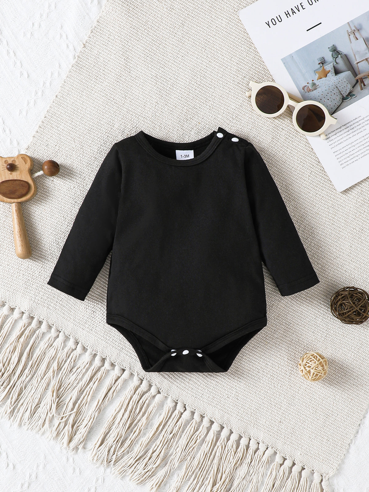 Modern Chic Minimalist All-Season Unisex Baby Jumpsuit, Ages 0-6 Months | Color: Black | Image 1