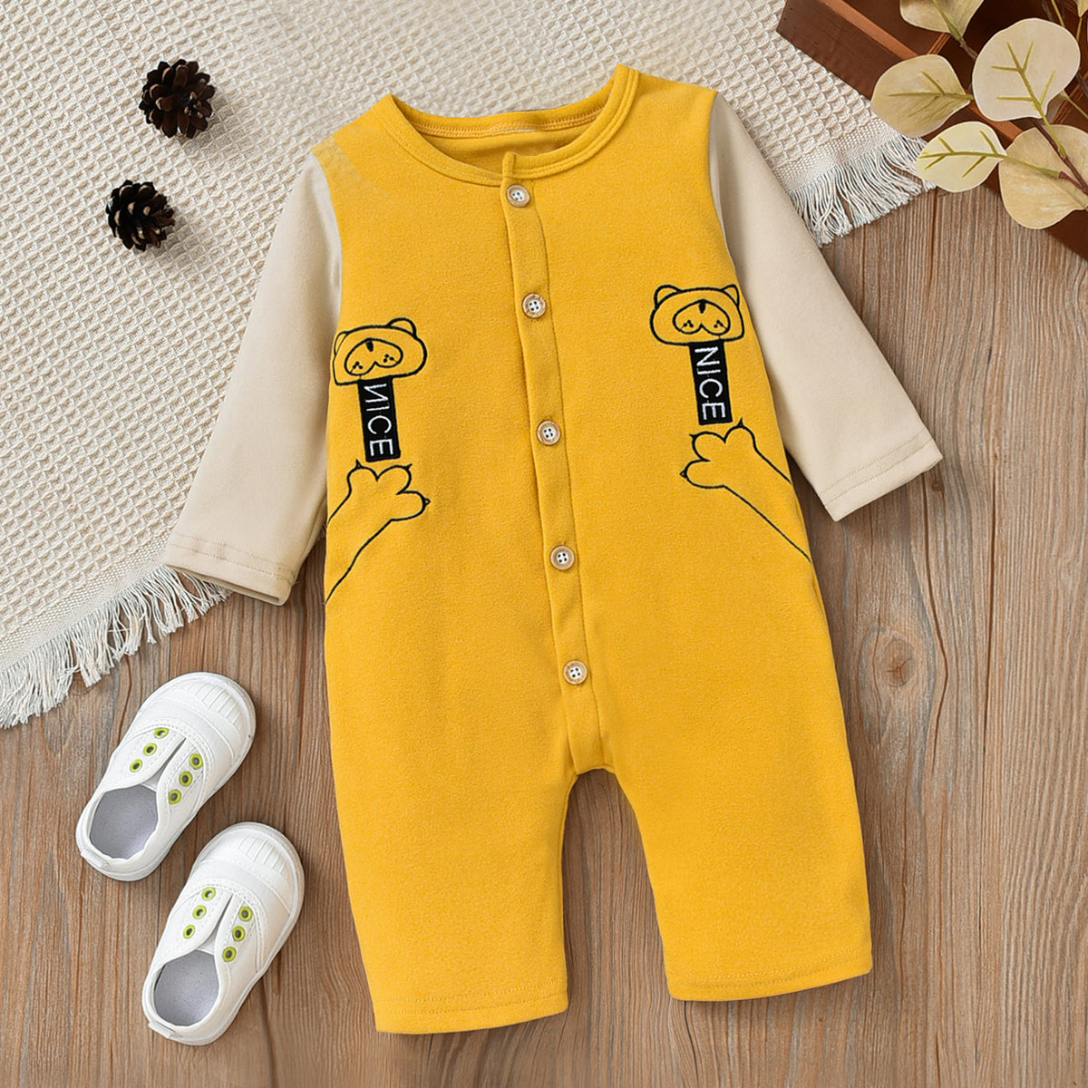 Minimalist Autumn Unisex Baby Jumpsuit, Ages 1-12 Months | Color: Yellow | Image 1