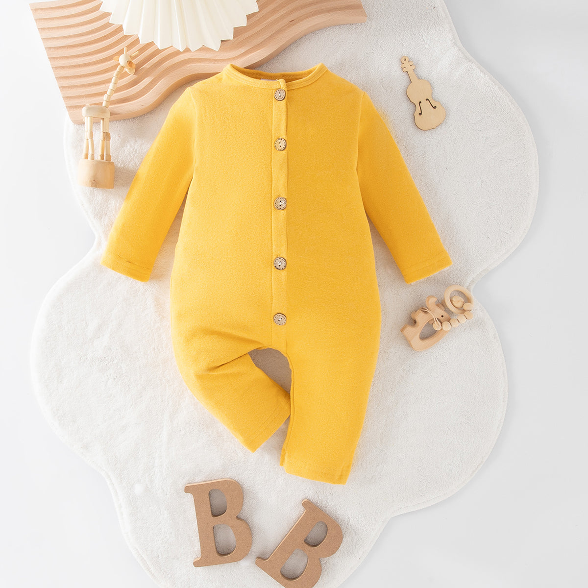 Minimalist Autumn Unisex Baby Jumpsuit, Ages 1-9 Months | Color: Yellow | Image 1