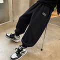 Minimalist Autumn Unisex Kids' Casual Pants, Ages 2-7 | Color: Black | Image 1