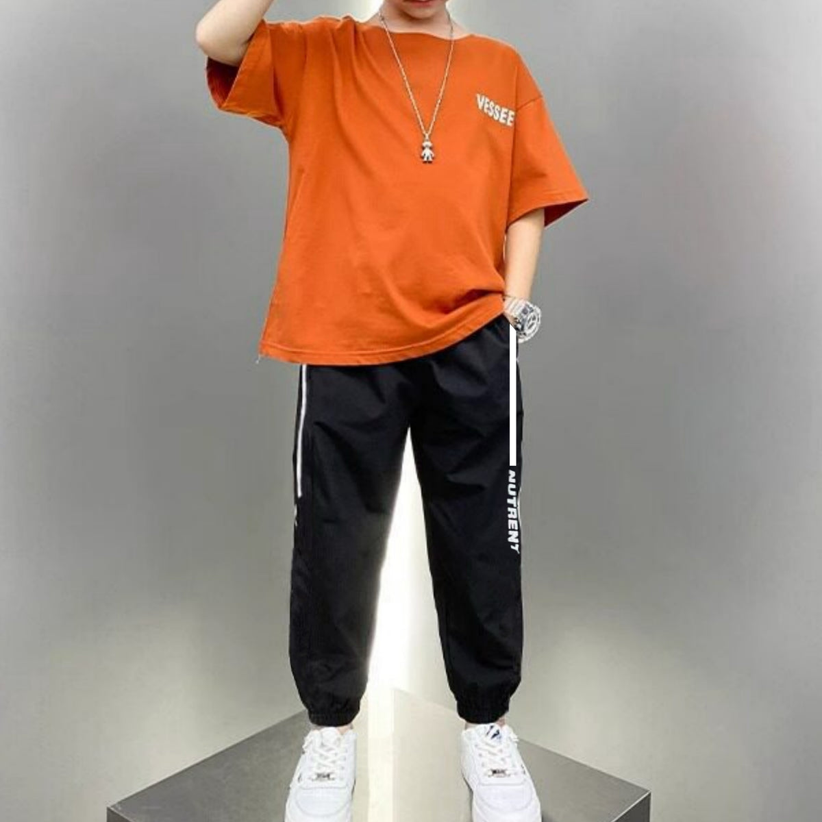 Minimalist Summer 2-Piece Boys' Pants Suit, Ages 4-14 | Color: Orange | Image 1