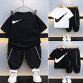 Modern Chic All-Season Minimalist Summer 2-Piece Boys' Pants Suit, Ages 2-9 | Color: Black | Image 1